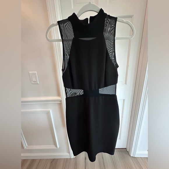 Betsy Adam high neck black dress with mesh sides. - Picture 1 of 4
